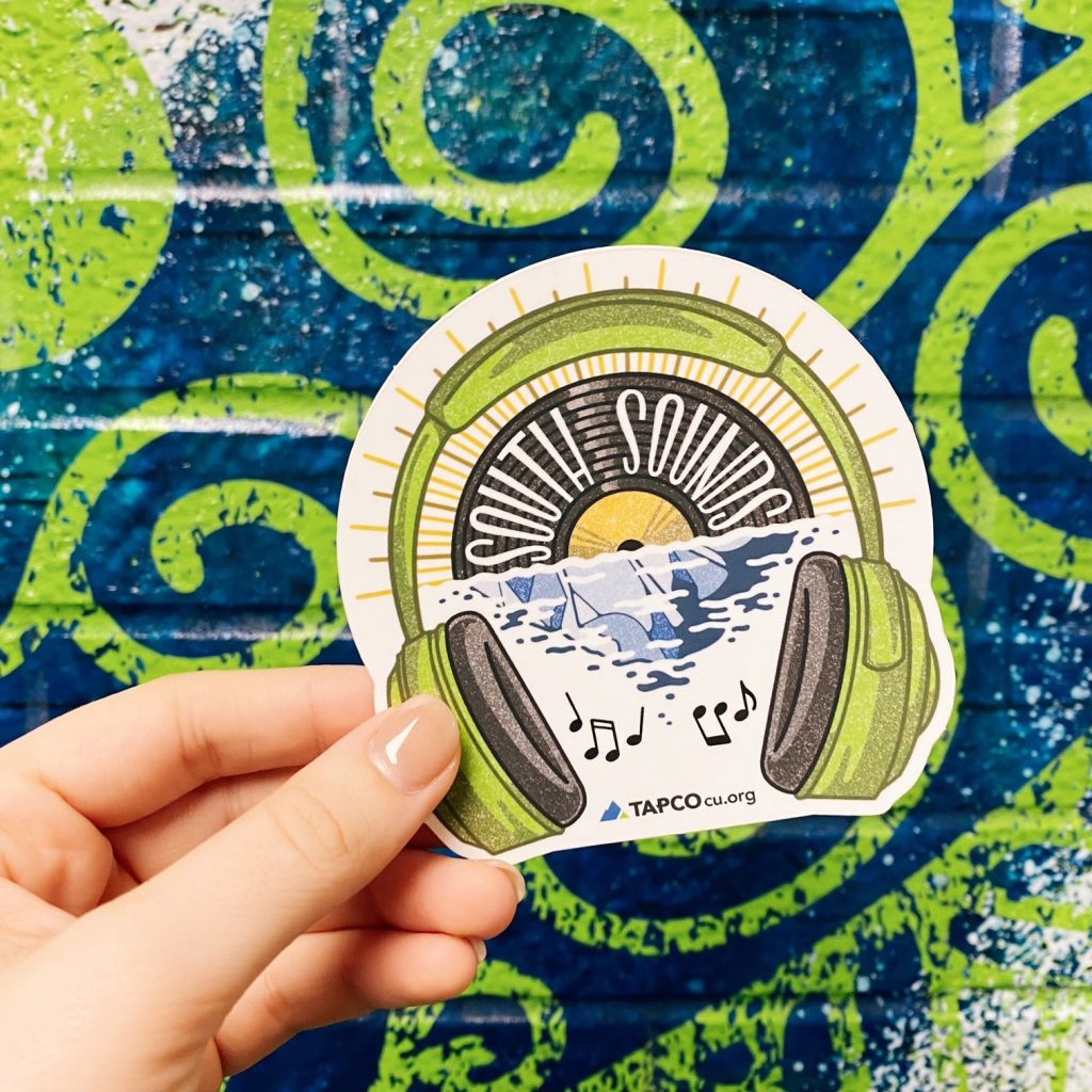 TAPCO sticker in front of TAPCO mural