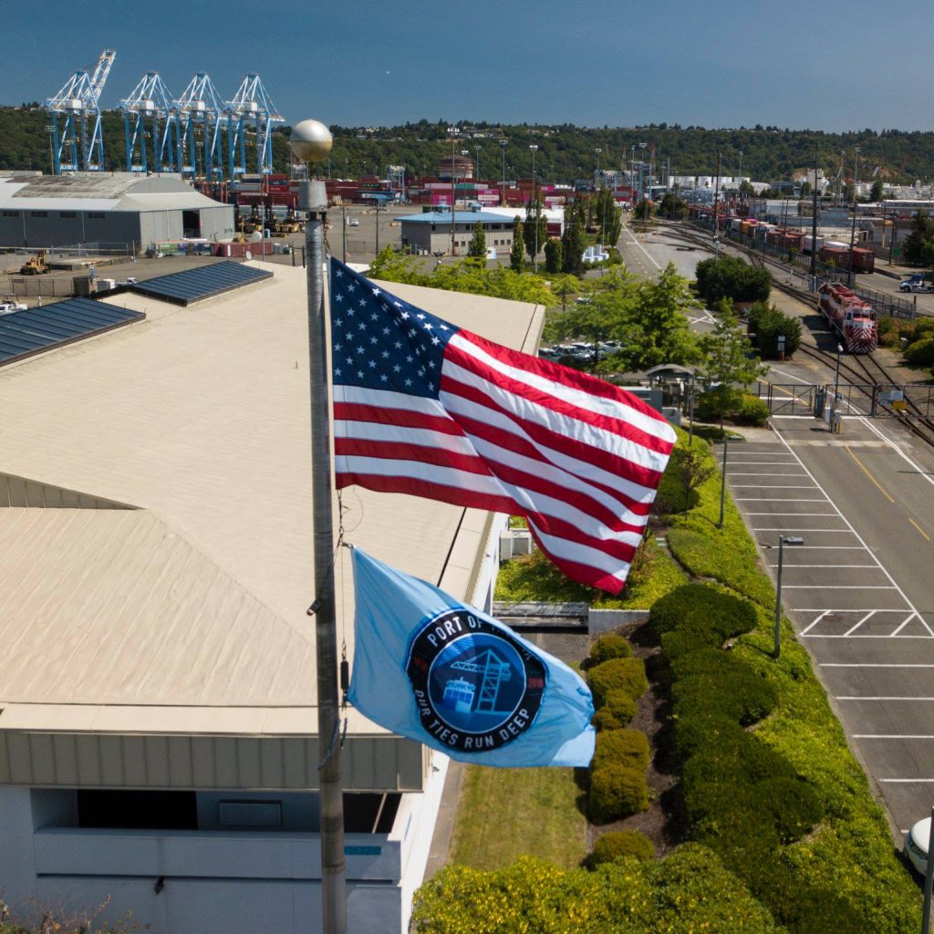 American Flag and Port of Tacoma Flag flying together