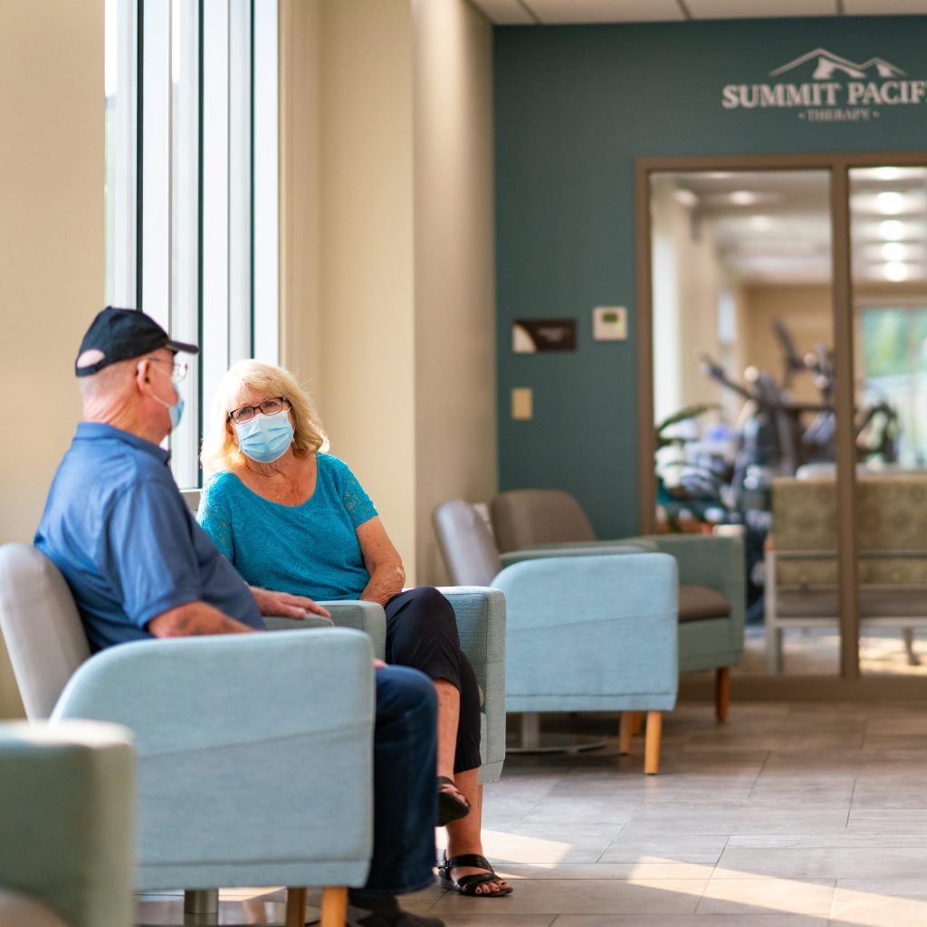 photo of two people in the waiting room at Summit Pacific Medical Center