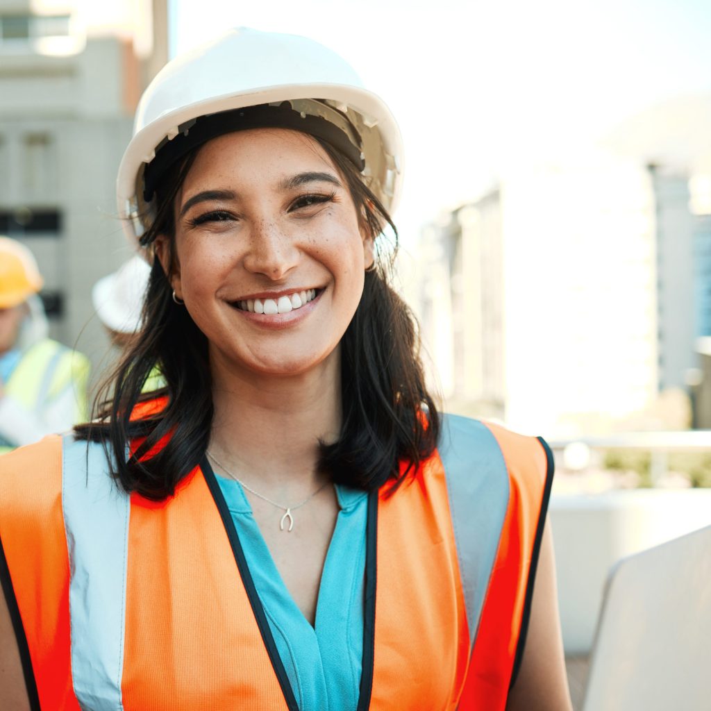 photo of a Bates Technical College graduate working at a construction site