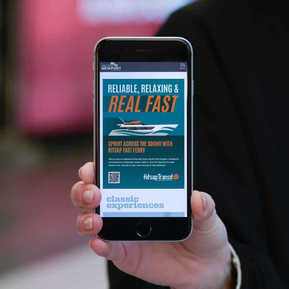 photo of mobile phone with a Kitsap Transit ad on it