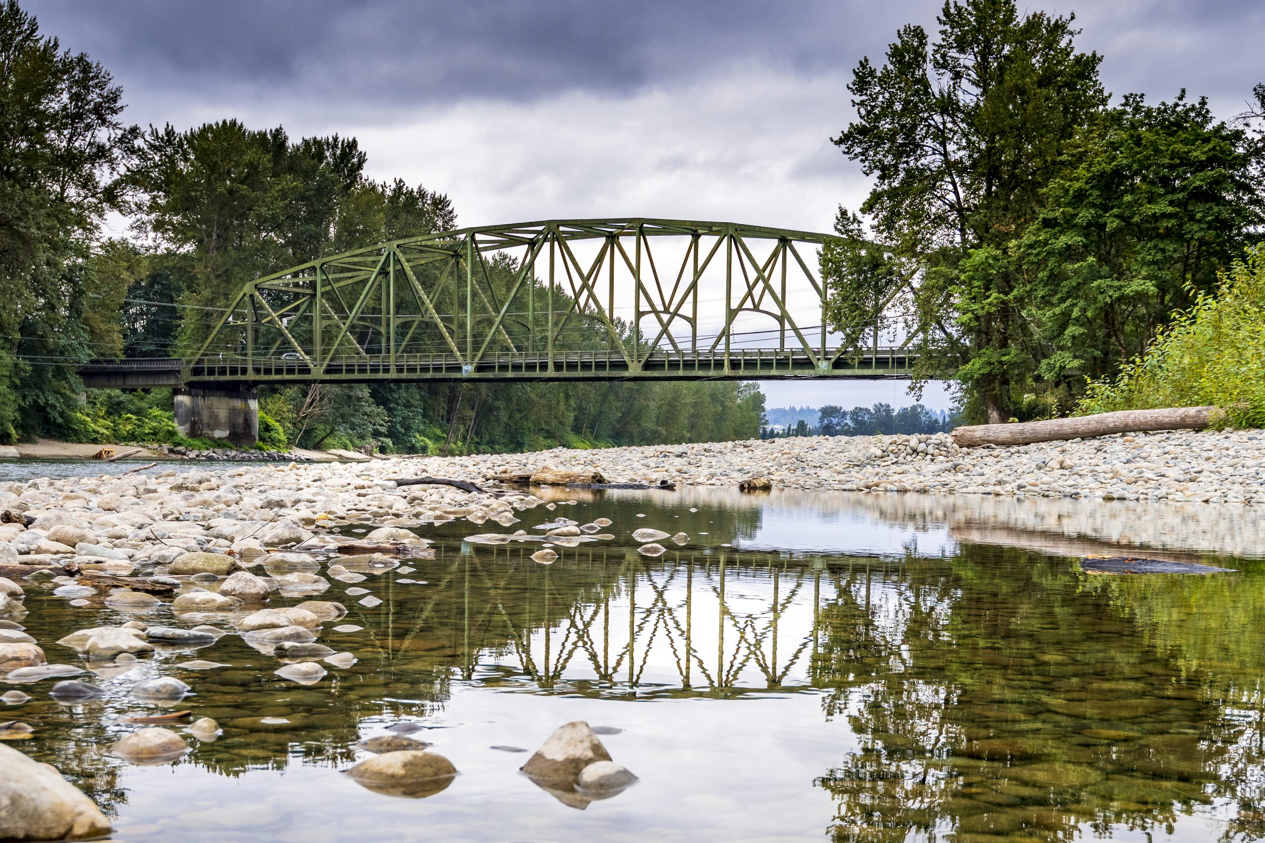 photo of a bridge with a shallow river running underneath located in Monroe, Washington