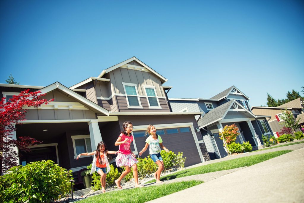 Photo of children playing in front of Brookfield built homes