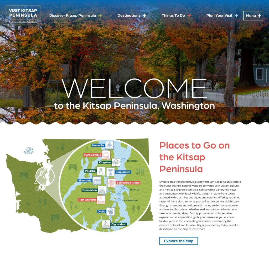 A screenshot of the visit kitsap peninsula homepage. It features a scenic shot of houses in Port Gamble in Autumn, with a detailed map of locations to visit.