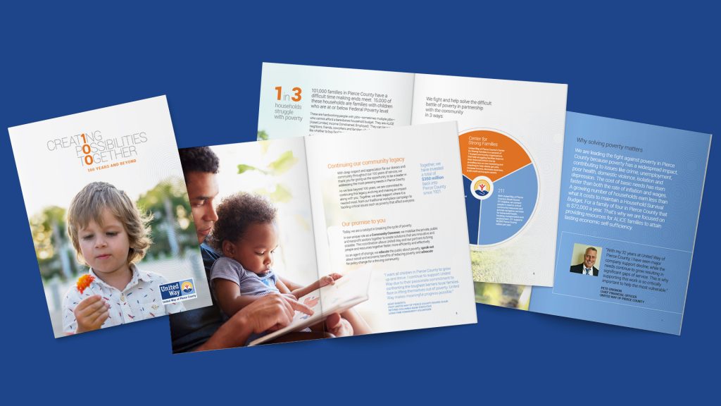 A stack of United Way Pierce County materials, displayed intentionally on a solid blue surface.
