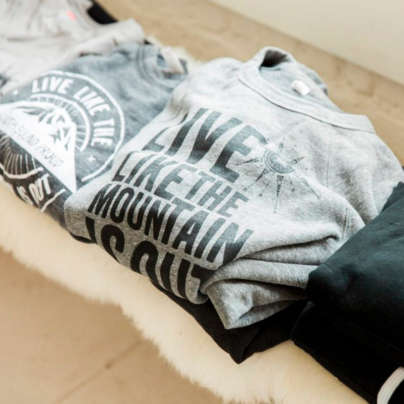 Stacks of different Live Like the Mountain is Out shirt designs